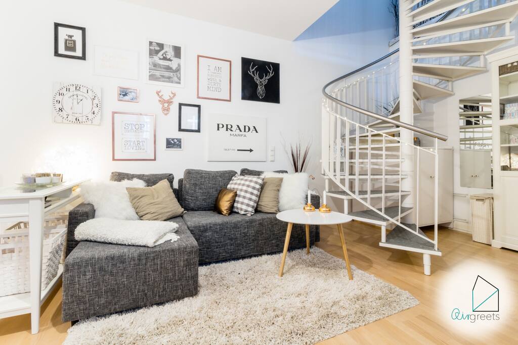 The large and compfy sofa invites you to relax.