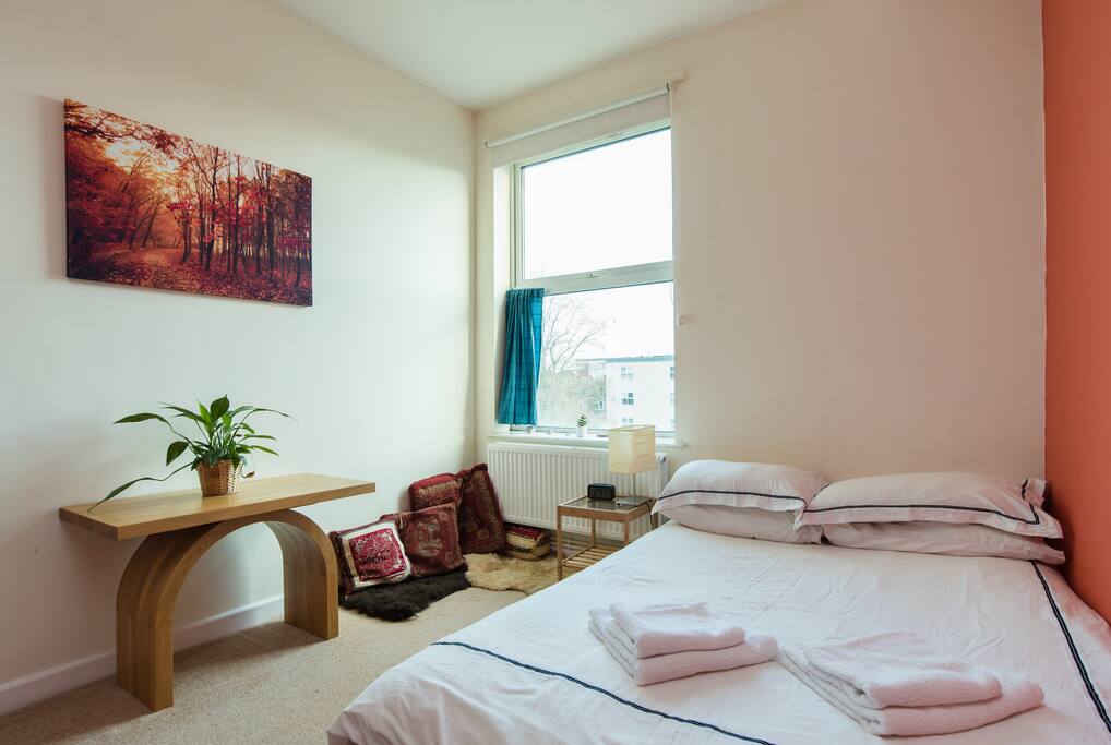 Thick and firm futon mattress made from pure wool and cotton, with a woollen duvet.