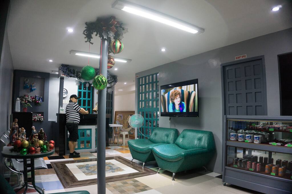 The main Lobby with 55 inch 4k HD Led television, it has also a mini mart that sells snack foods and drinks, and other toiletry needs. This is also a waiting area for visitors.