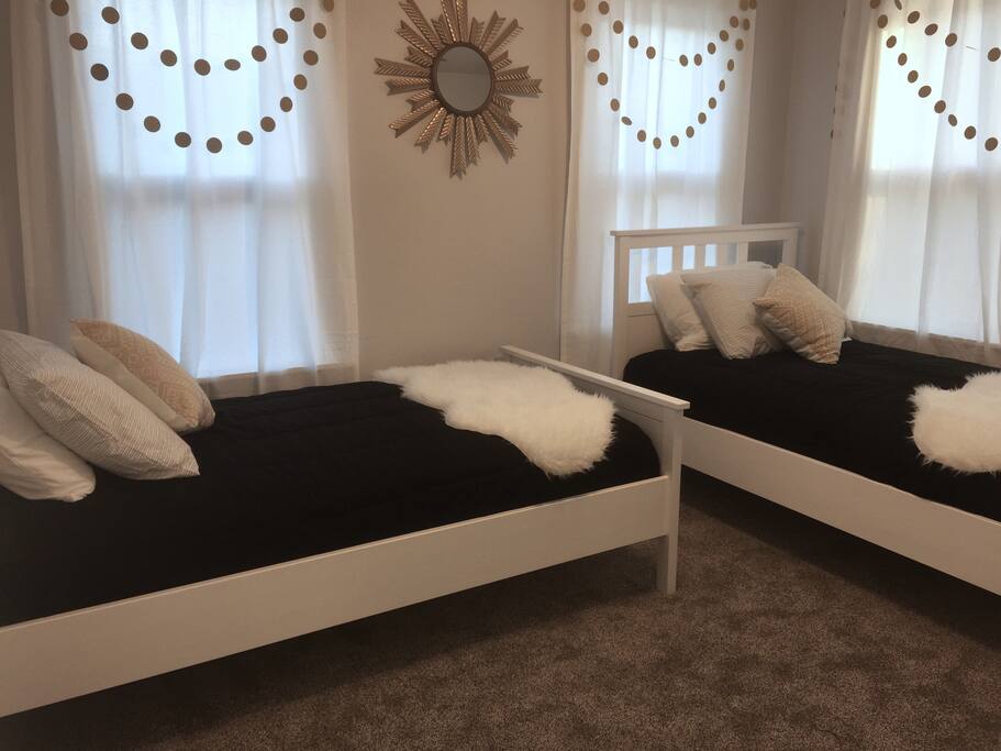 Second bedroom has two twin beds.