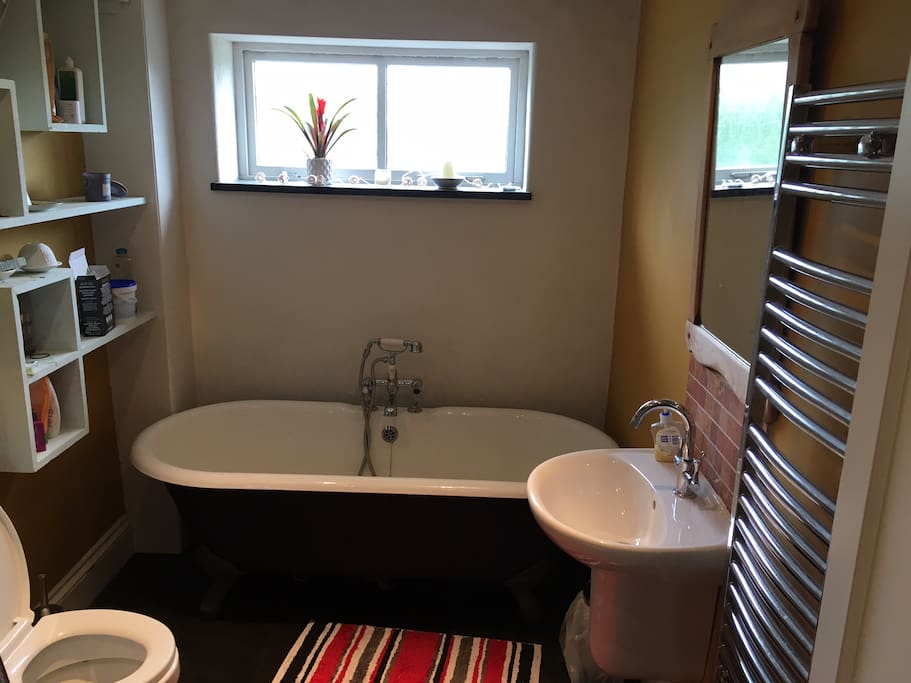 Bathroom with heated floor, shower and spill bath