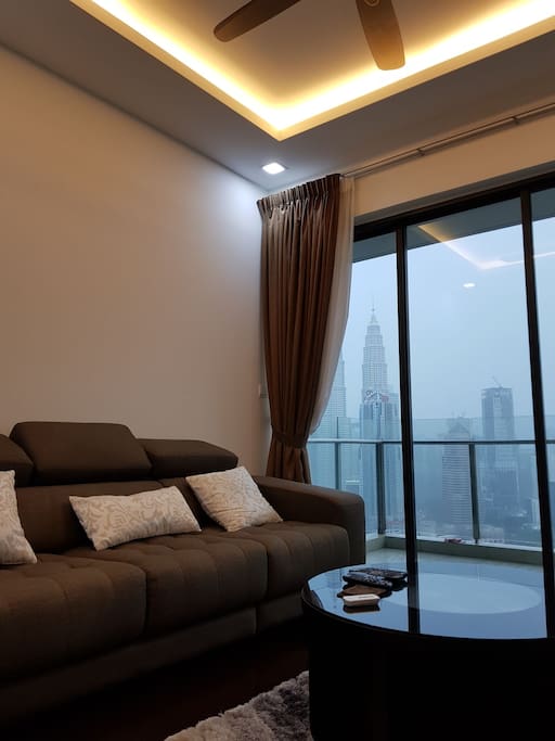 living room facing klcc and kl tower view
