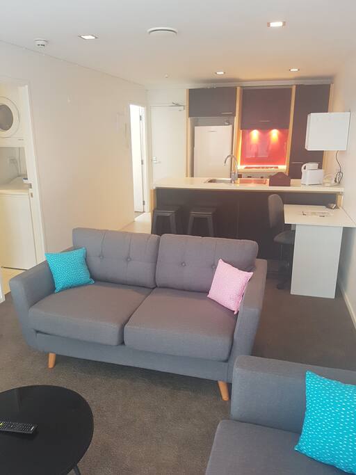 Lounge with Kitchen in the background