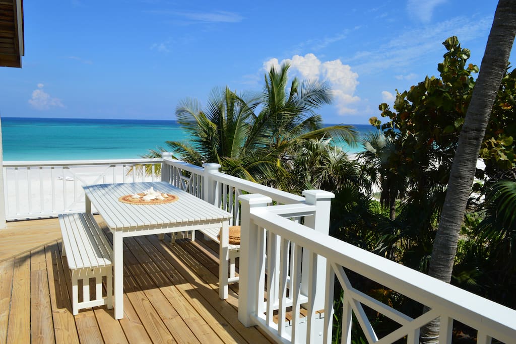 View to the beach from the outdoor dining area on the new wrap-around deck.