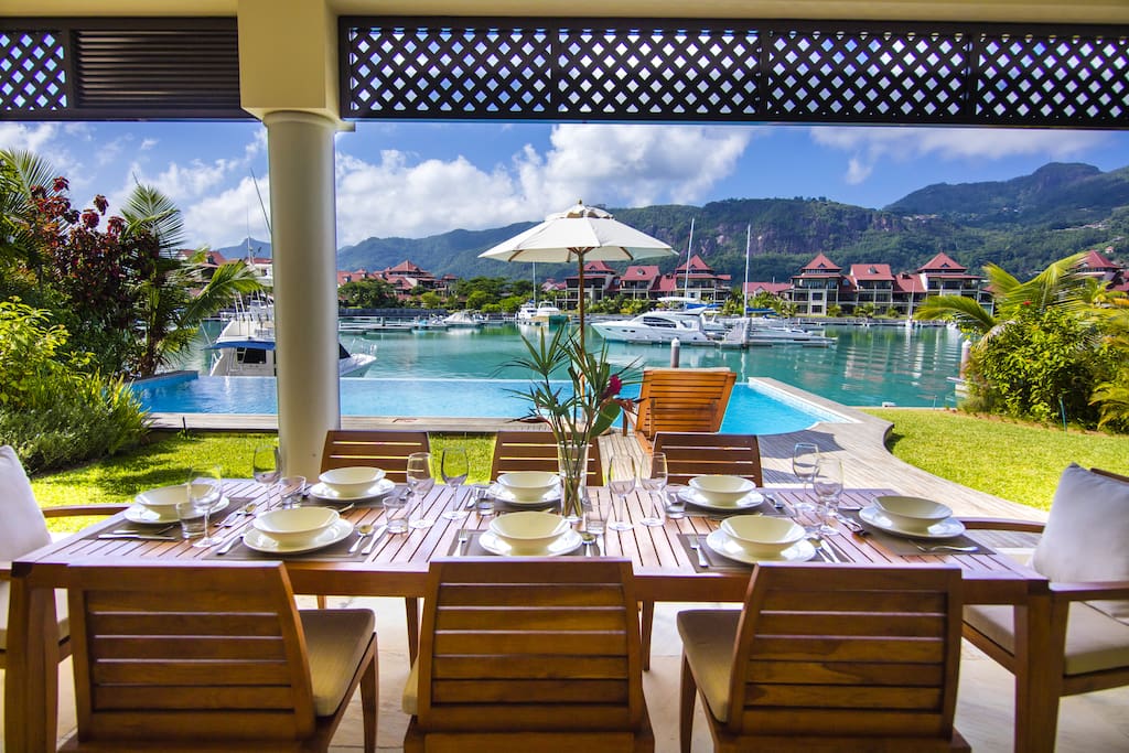 View on the characteristic Seychelles mountains and the private and tranquil marina