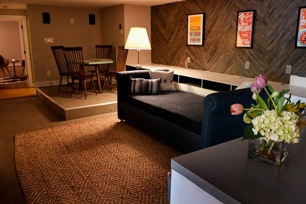 Dining area/living room with twin daybed (the trundle rolls out from under the daybed).
