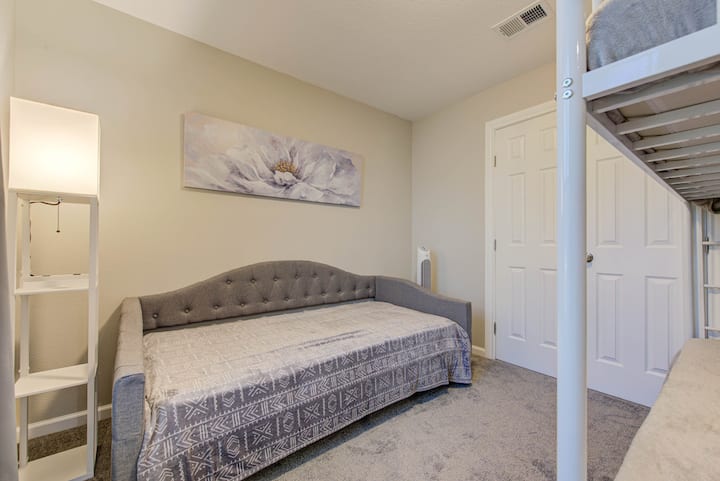 Kids room, 2nd floor. Can sleep four. Includes sleeper sofa, bunk bed, and a pull-out trundle - all twin size memory foam mattresses. Blackout curtains.