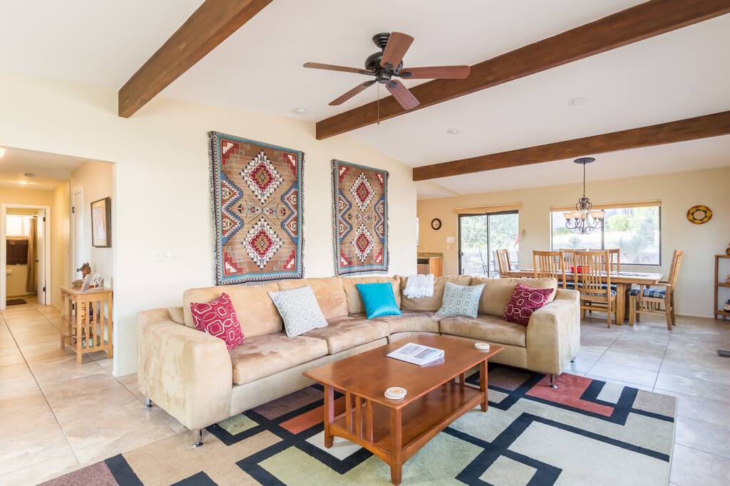 The open floor plan living room and dining room is spacious and a great spot for entertaining.