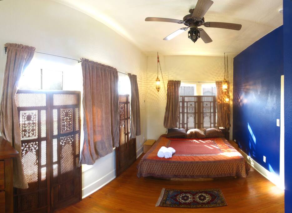 Salon Blue, king bed, generous morning light