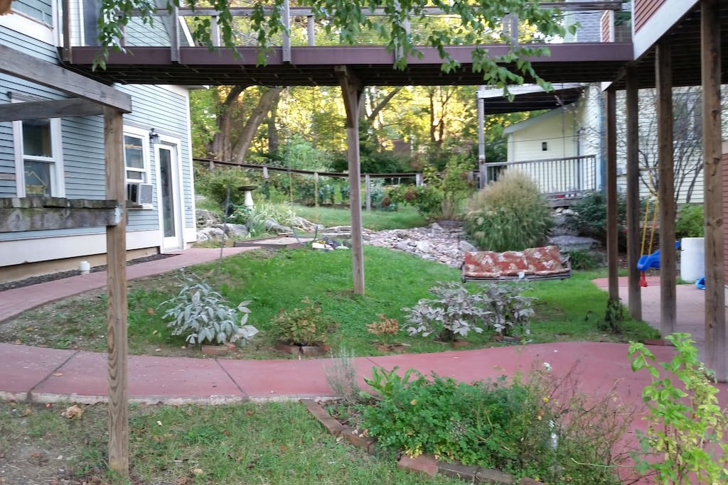 Play area. One swing, sandbox, porch swing.