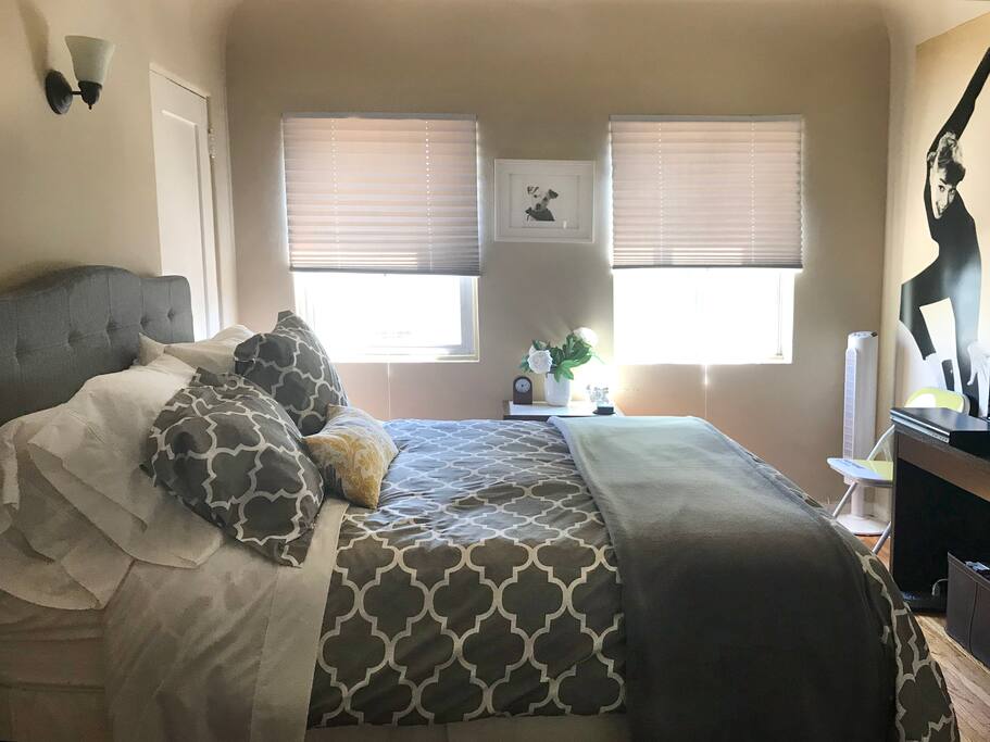 The room has darkening shades with single cord operation.