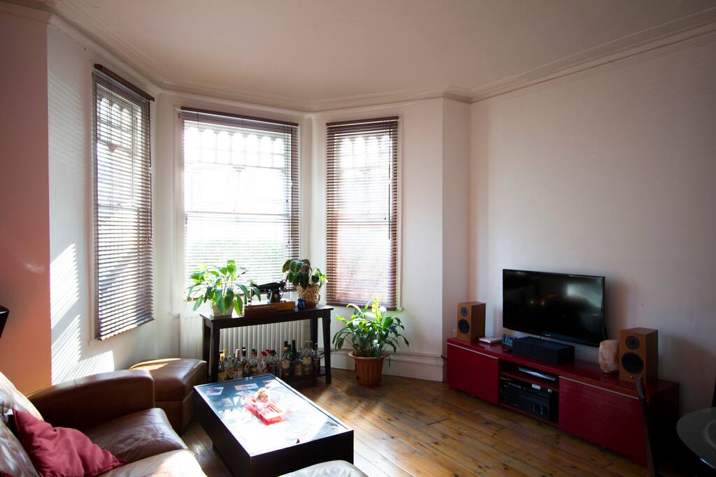 Living room with flat screen TV and Sky channels