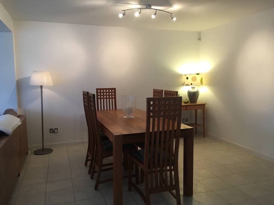 Open Plan Dining/living/kitchen- extremely spacious open plan living space at the rear of the property includes large dining table that will comfortably seat 6. In the modern kitchen area is an additional table that will seat 4-6 people. The Large L-shaped leather sofa offers comfortable relaxed living. Flat screen TV.
