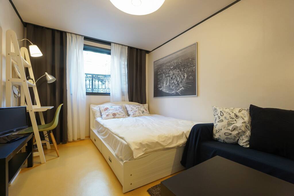 Full view of the bedroom where 3 people can sleep (queen size bed for 2 + sofa bed for 1)