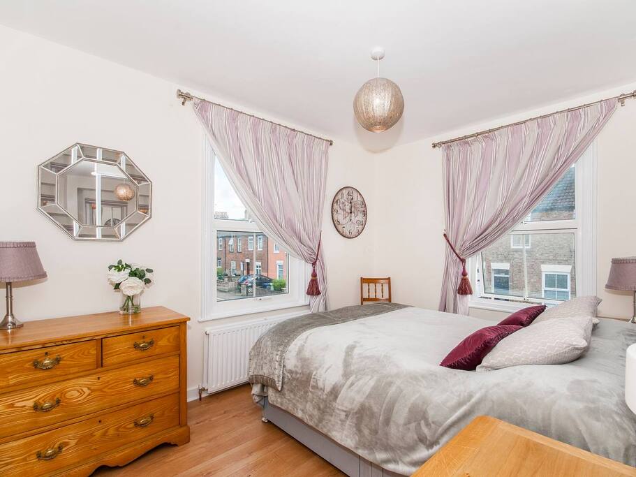 Bedroom facing the windows