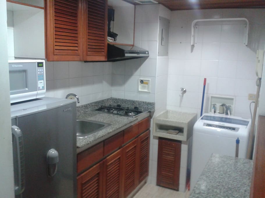 Fully equiped kitchen including refrigerator and washing machine