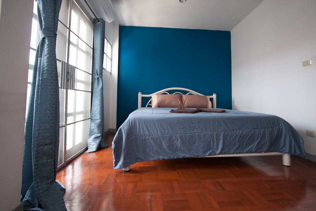 Private 3rd floor bedroom with air conditioner