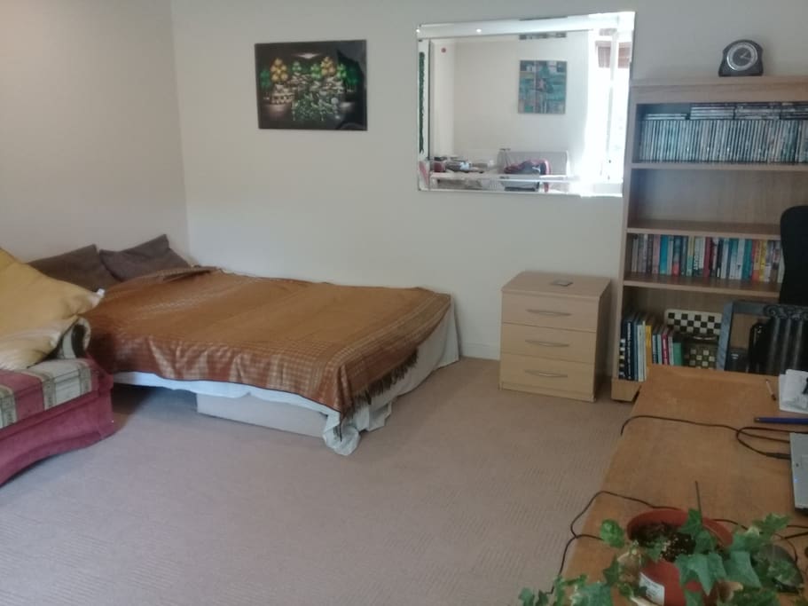 Spacious bed sitting room with double bed...