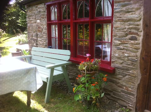 Quirky  Stone Studio with woodburner.