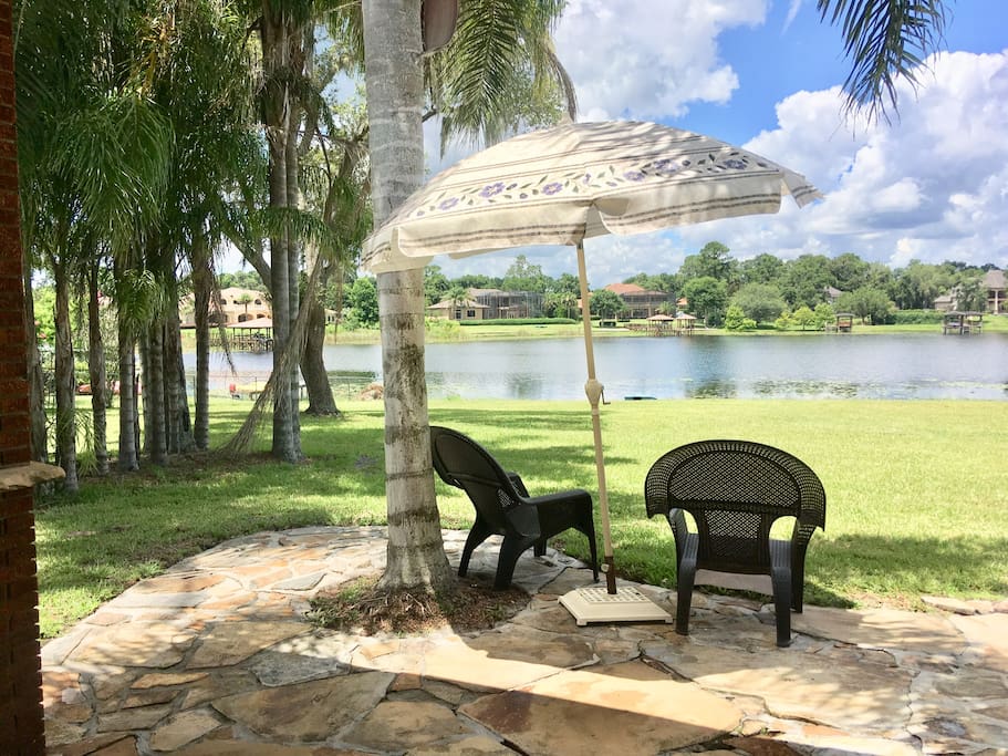 Outdoor patio area with barbecue and view of Lake Markham