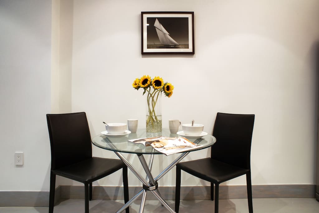 Glass dining table with chairs