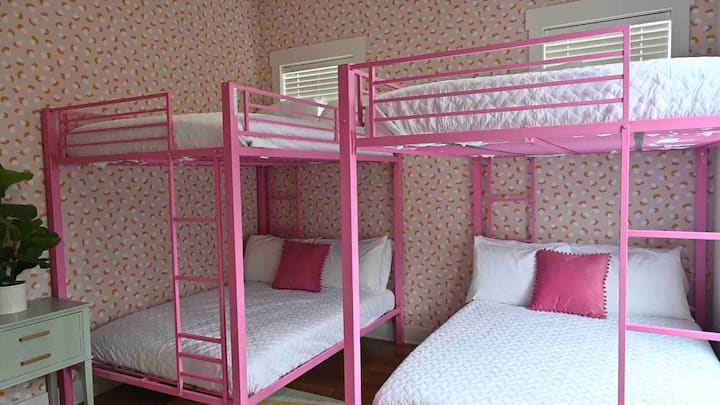 Bunk room includes two FULL OVER FULL bunk beds, two person beauty bar, and an adjoining bathroom with a shower/tub