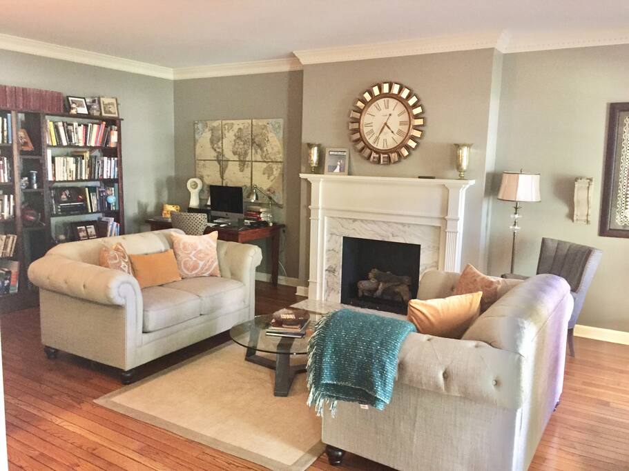 Study with remote fireplace. Features two love seats
