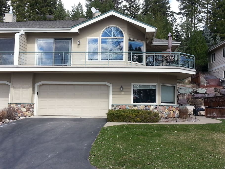 View of our place and Whitefish Mtn Resort in background. Photo taken at City Beach on Whitefish Lake
