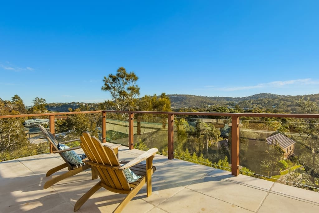 Relaxed sun drenched deck overlooking Avalon Beach