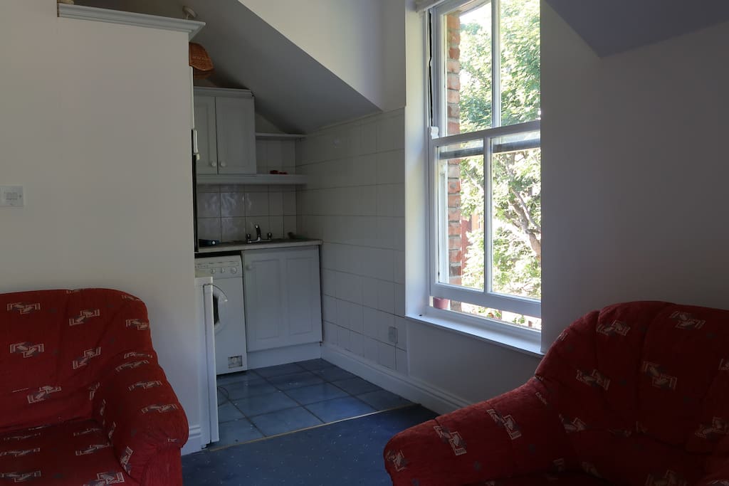 Sitting room with a small kitchen
