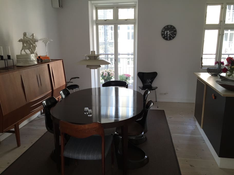 Dining room with access to balcony.