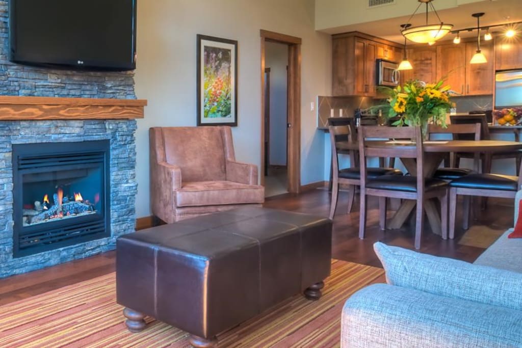Warm up next to the stone fireplace after a day outside