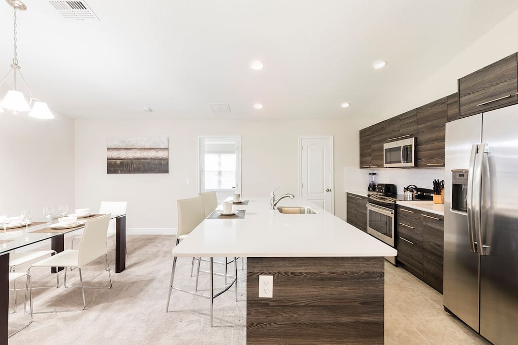 Prepare meals in the fully-equipped kitchen and enjoy them at the breakfast bar or dining table.