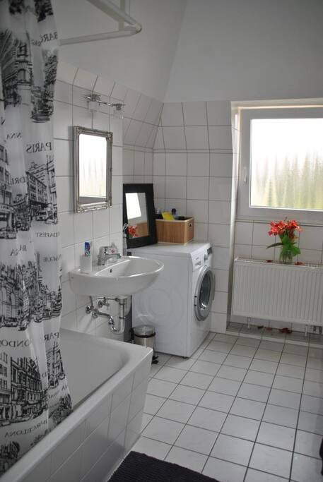 The bathroom with bathtub. WC is separate..