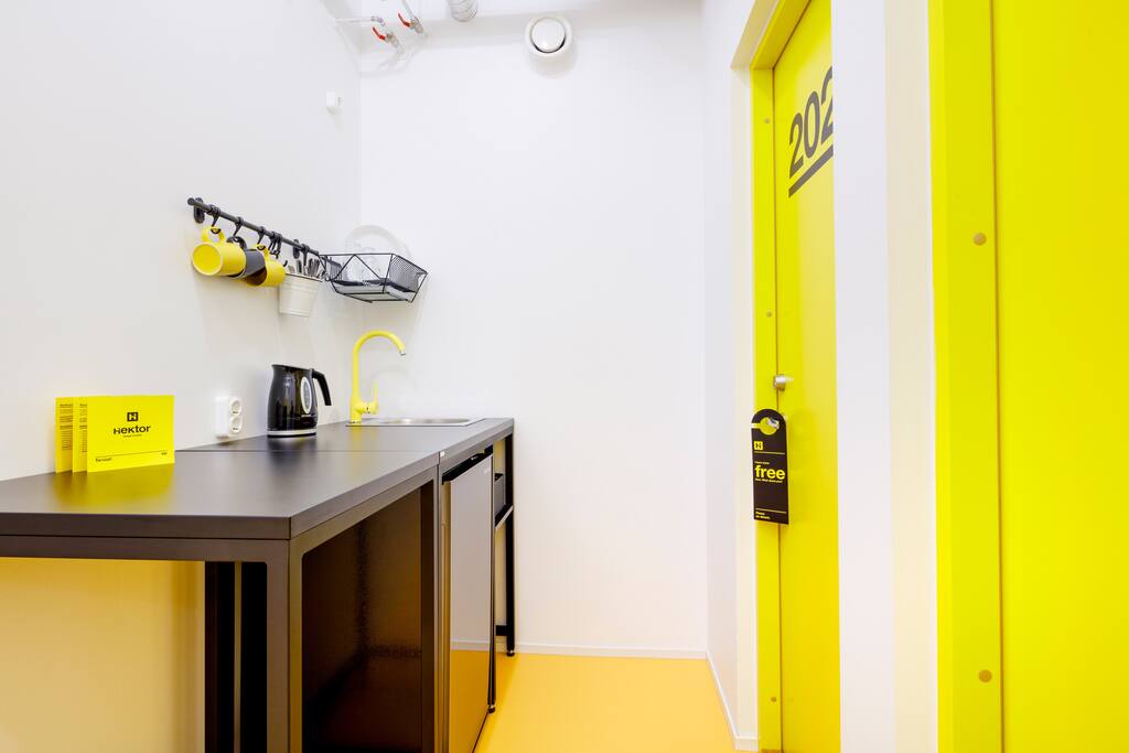 Shared kitchenette in a 4 room apartment with essentials