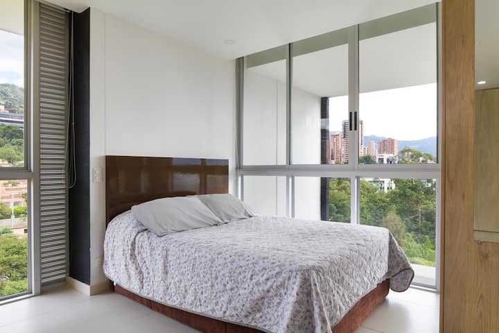 Bedroom with a wonderful view. The window has block out curtains for privacy. 