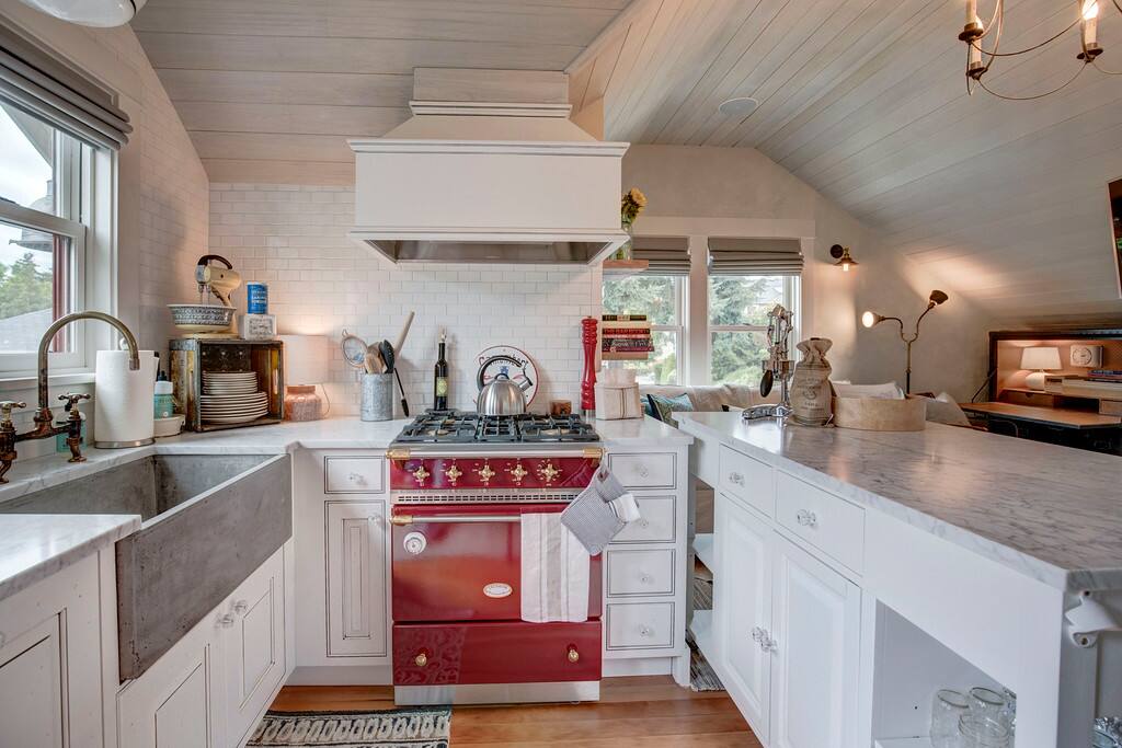 Apron sink and French gas range in Chef's kitchen.