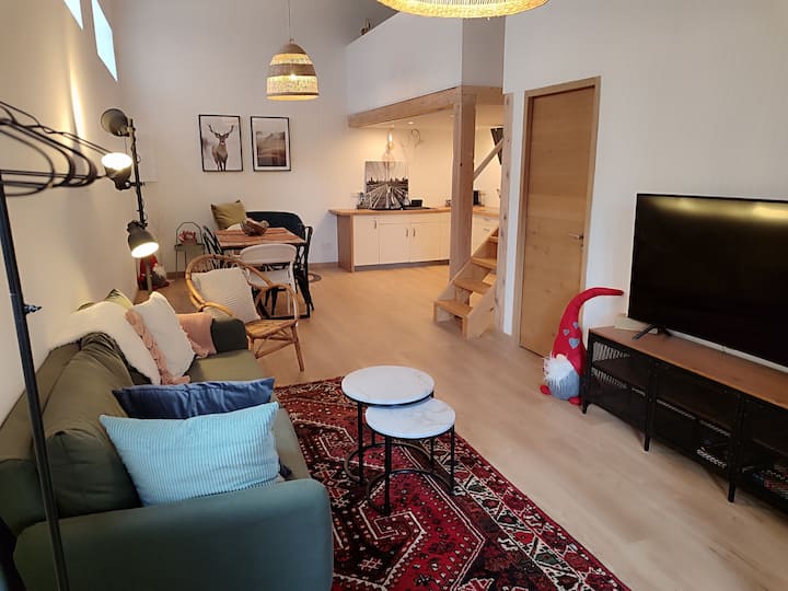 The Warm Loft 
1 minute from the tram