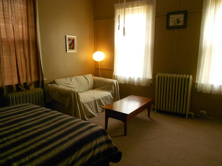 There is a loveseat (pretty old and shows wear) with a fresh cover for every guest.