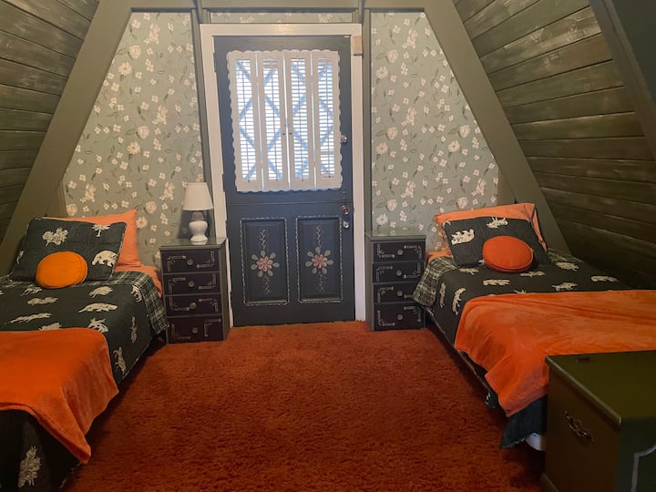 We call this Hantzel and Gretel’s loft. Door opens to deck above the front porch.