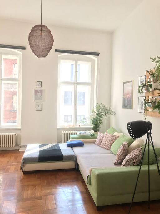 The bee hive lamp and the art give this room its unique energy