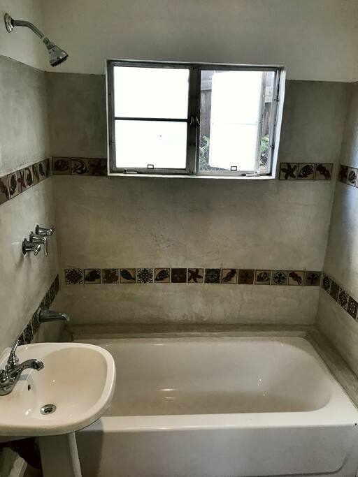 Here is the restroom w beautiful handmade tile.