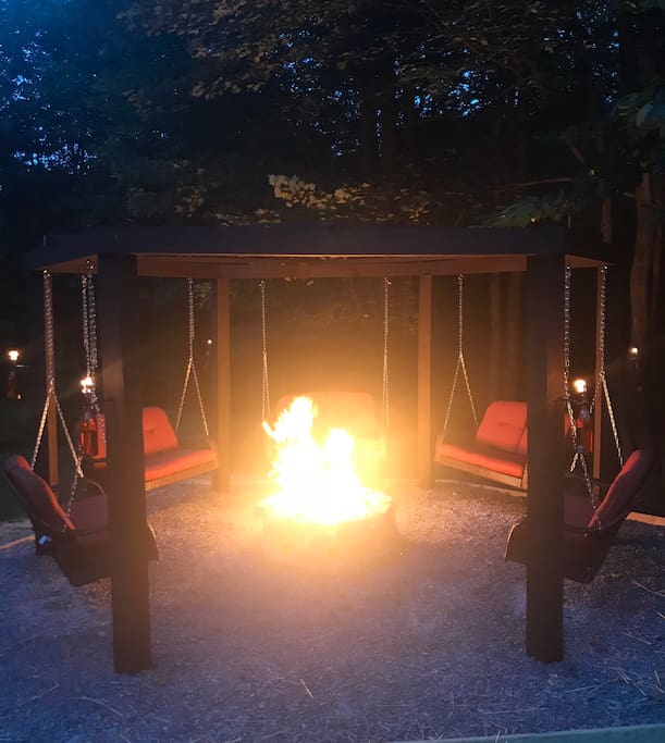 The swingset fire pit is the ultimate vacation hangout spot! The tiki torches are treated with bug repellant.