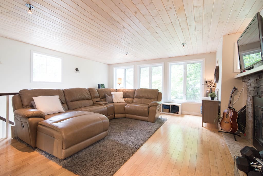 Plenty of space for everyone on the big, comfy sectional couch in the living room