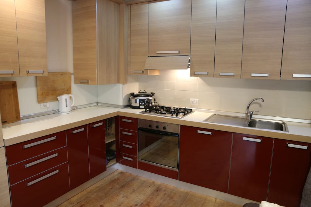 Well equipped kitchen area including dishwasher, microwave and slow cooker