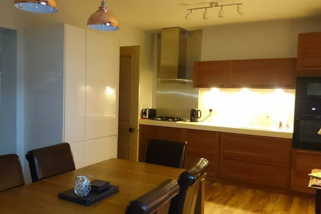 Modern, well equipped kitchen with dining area