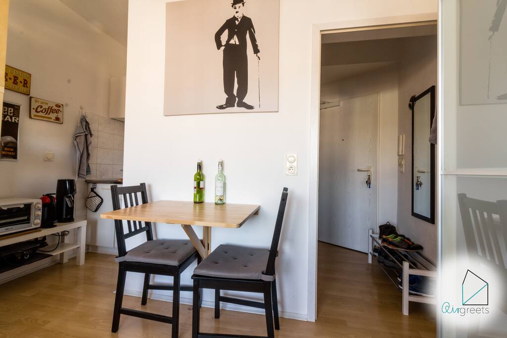There is a table to work and to dine at.