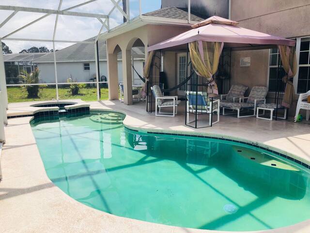 Private Room in a gorgeous home with pool.