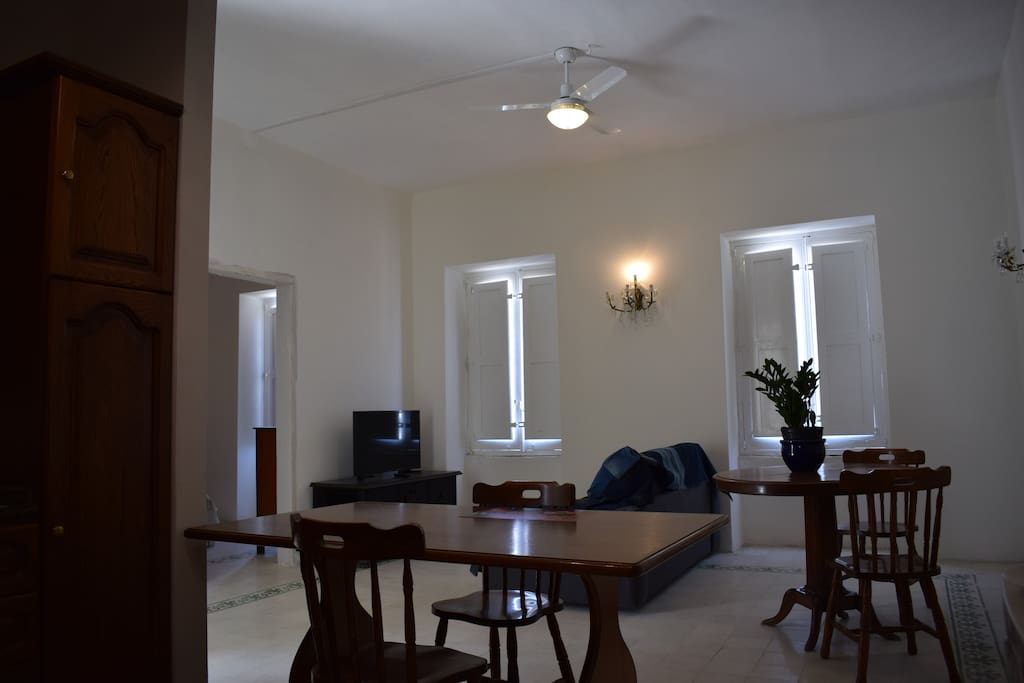 Living Room with wooden windows