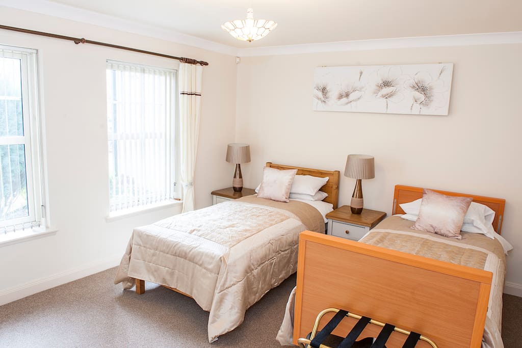 Bedroom 1 offers 1 x hospital bed and 1 x electric bed and en suite bathroom